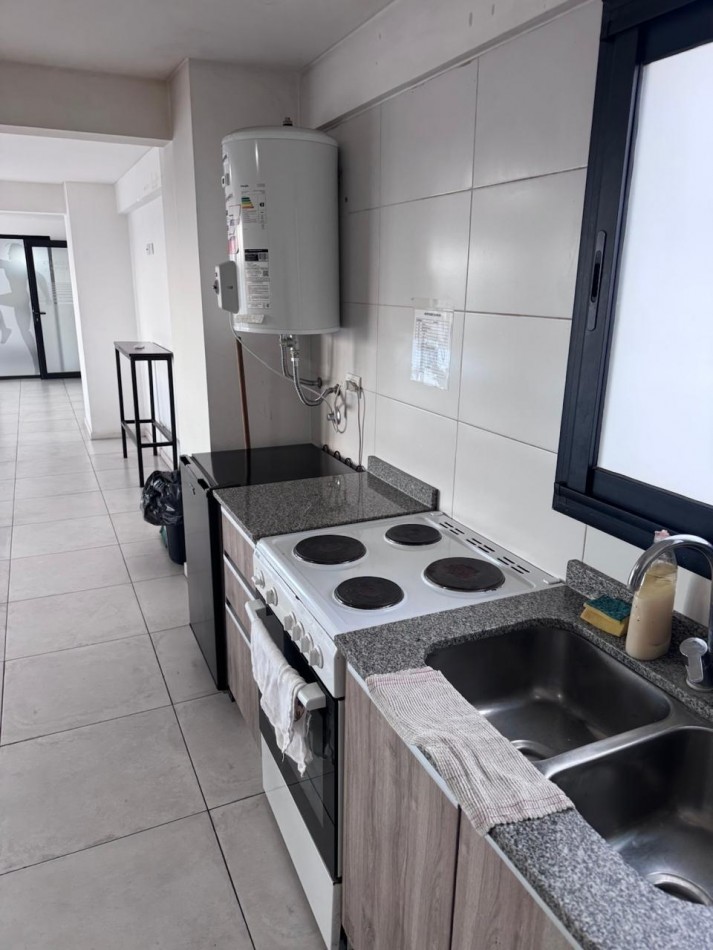 Venta - Departamento amueblado de 2 ambientes con doble cochera.