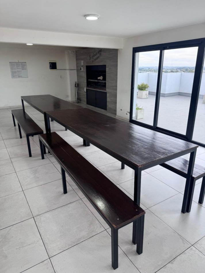 Venta - Departamento amueblado de 2 ambientes con doble cochera.